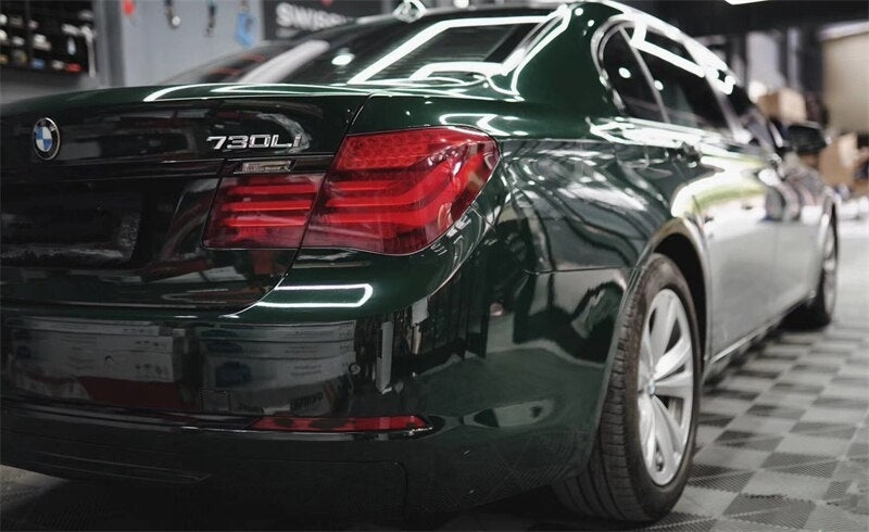 glossy metallic blackish green